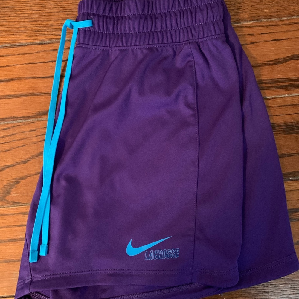 Nike Lacrosse. Purple with light blue. XS